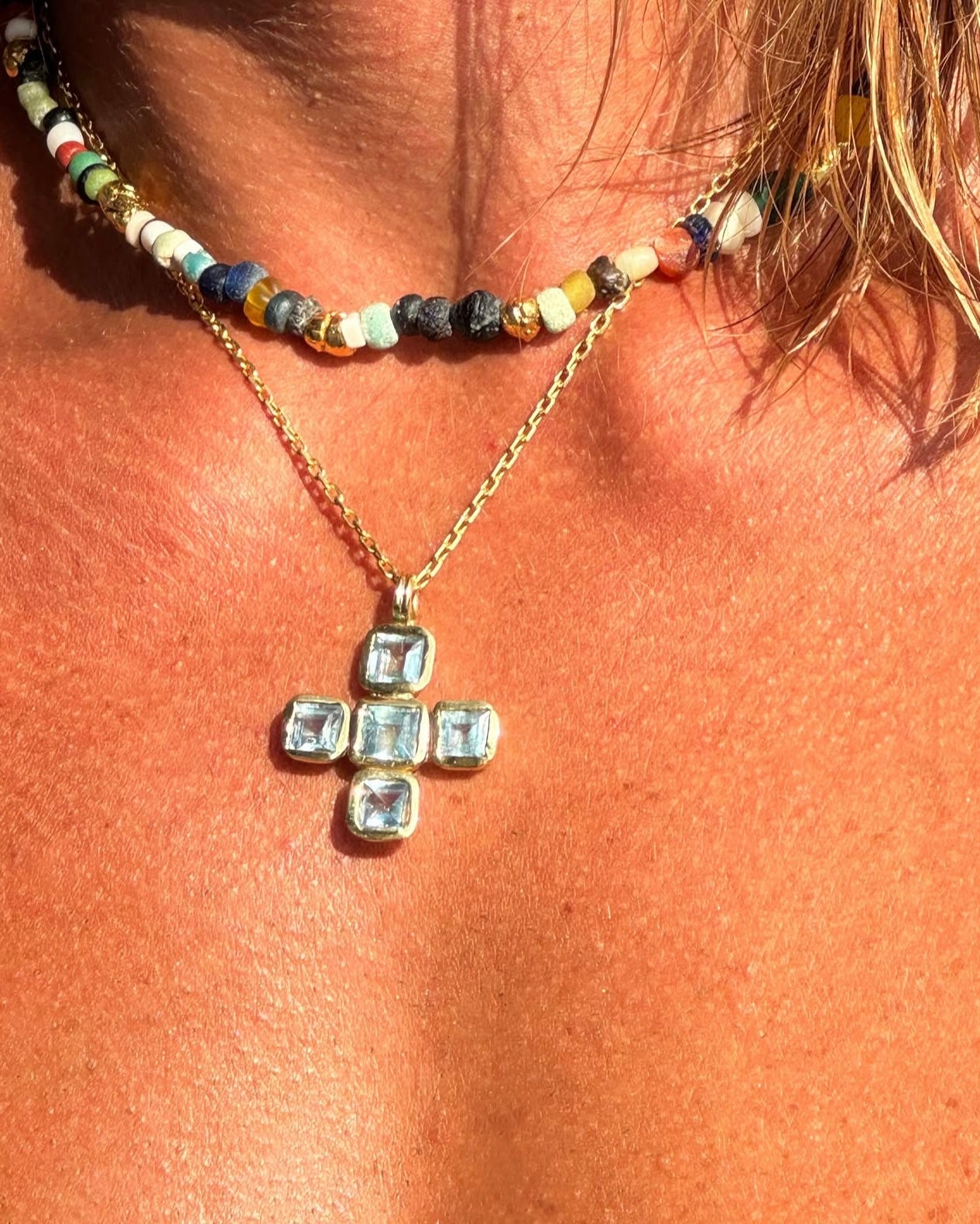 THE AQUA CROSS NECKLACE