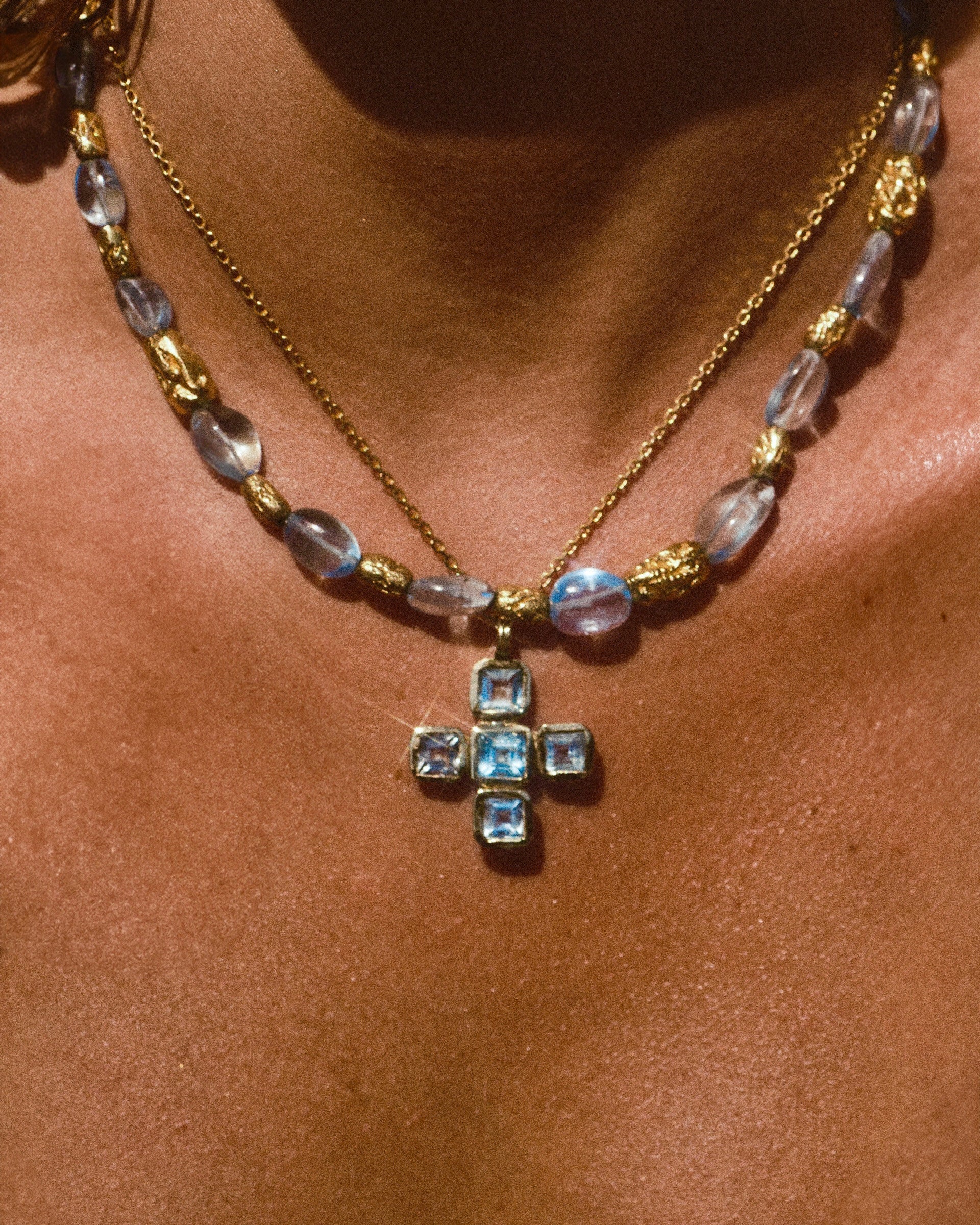 THE AQUA CROSS NECKLACE